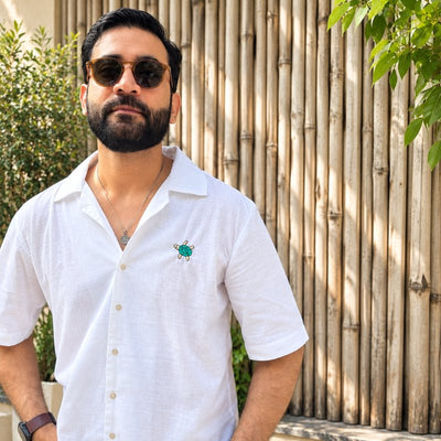 Men: a man in a white short-sleeved shirt