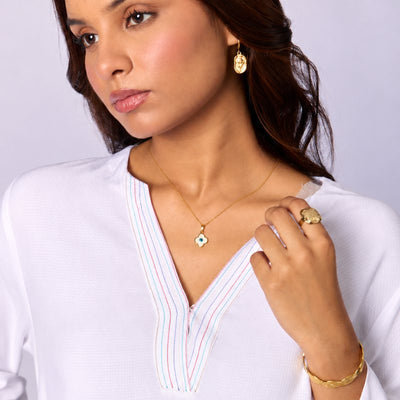 Imitation jewellery: gold-toned earrings, a pendant, a ring and a bangle