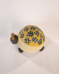 Kachhua Turtle Nerikomi Ceramic Figurine - Ochre Octothorpe - view 4 of 4