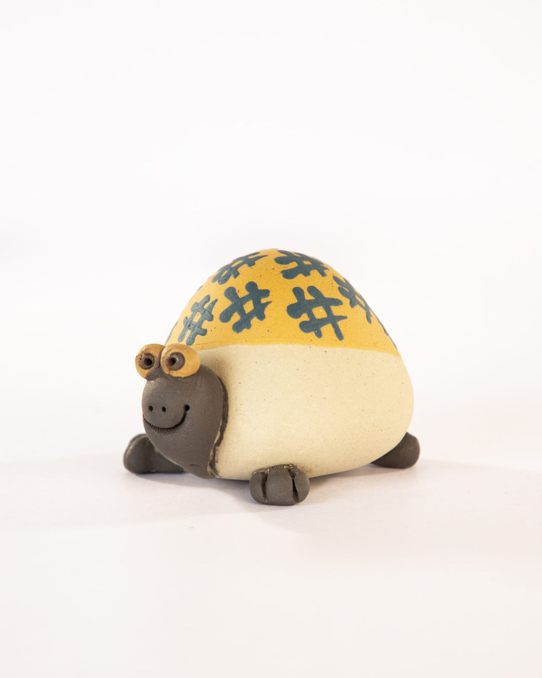 Kachhua Turtle Nerikomi Ceramic Figurine - Ochre Octothorpe - view 2 of 4
